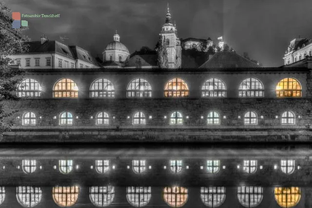 The market halls in Ljubljana are reflected in the Ljubljanica