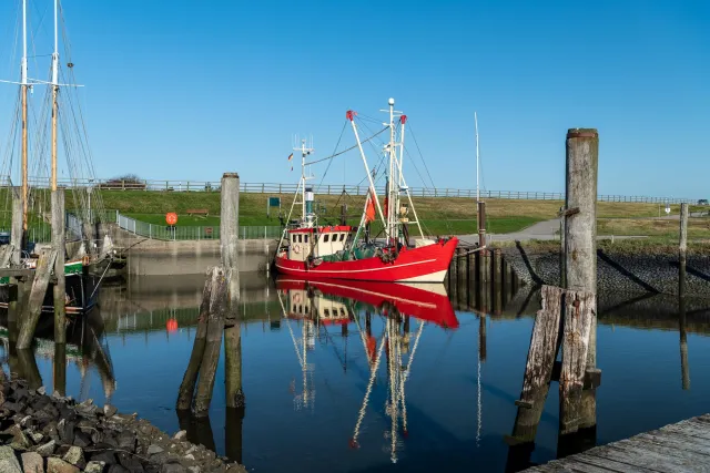 Red fishing boat in the southern harbor