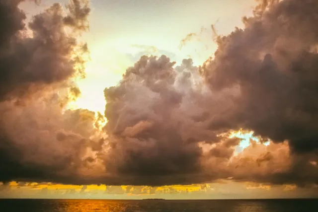 Sunset on Samalona across the Makassar Strait