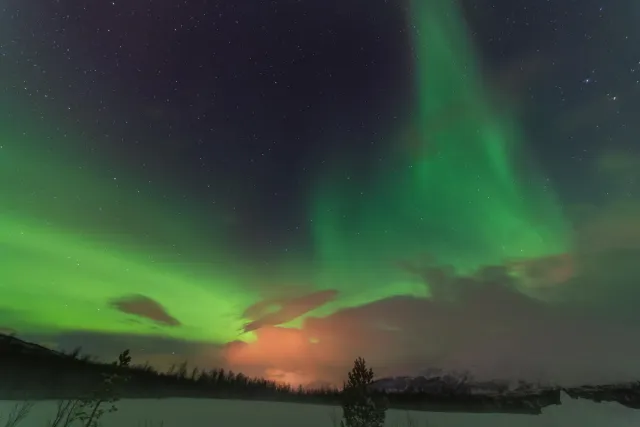 Northern lights in the Lyngenfjord Alps at the seventieth latitude