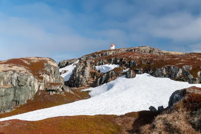 Climbing to the northern lighthouse in the north of Vardøya island