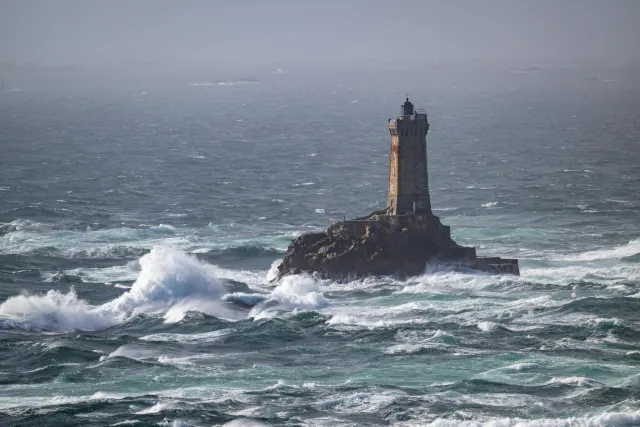 The lighthouse Phare de la Vieille in front of the Pointe du Raz